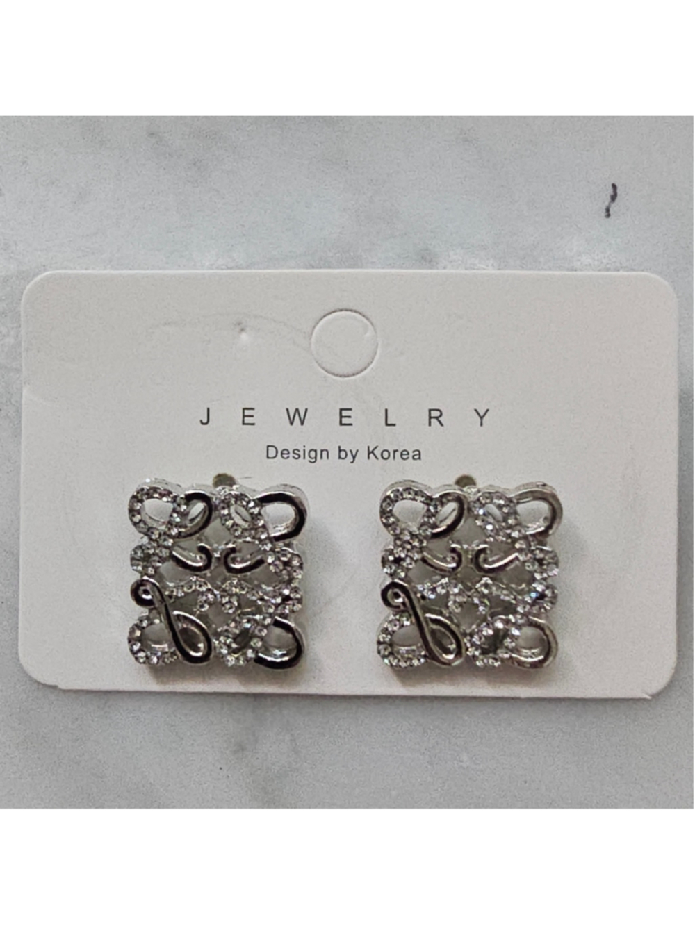 Silver Tone Rhinestone Bow Swirl Statement Stud Earrings